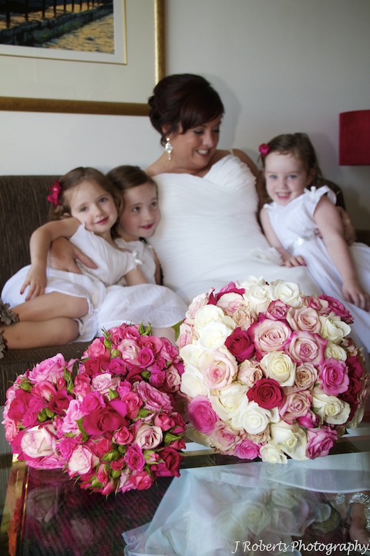 Bride with flower girls behind bridal bouquets by Show Posies - Wedding Photography Sydney